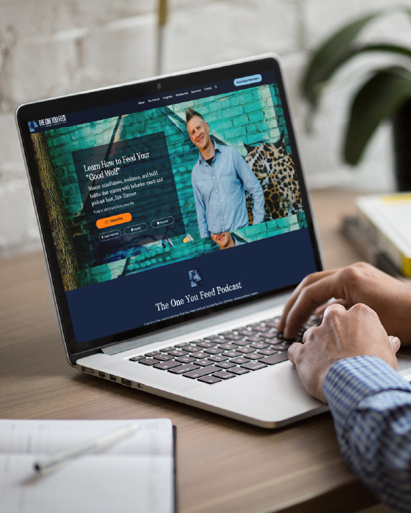 Person using a laptop displaying a podcast webpage with a woman smiling, text, and a blue background.